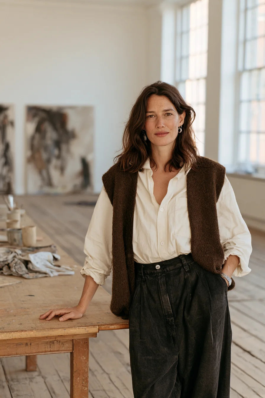 Clara Varenne beside her worktable