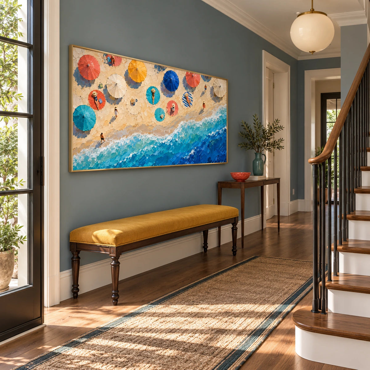 beach umbrellas and breaking waves displayed in a entry hall