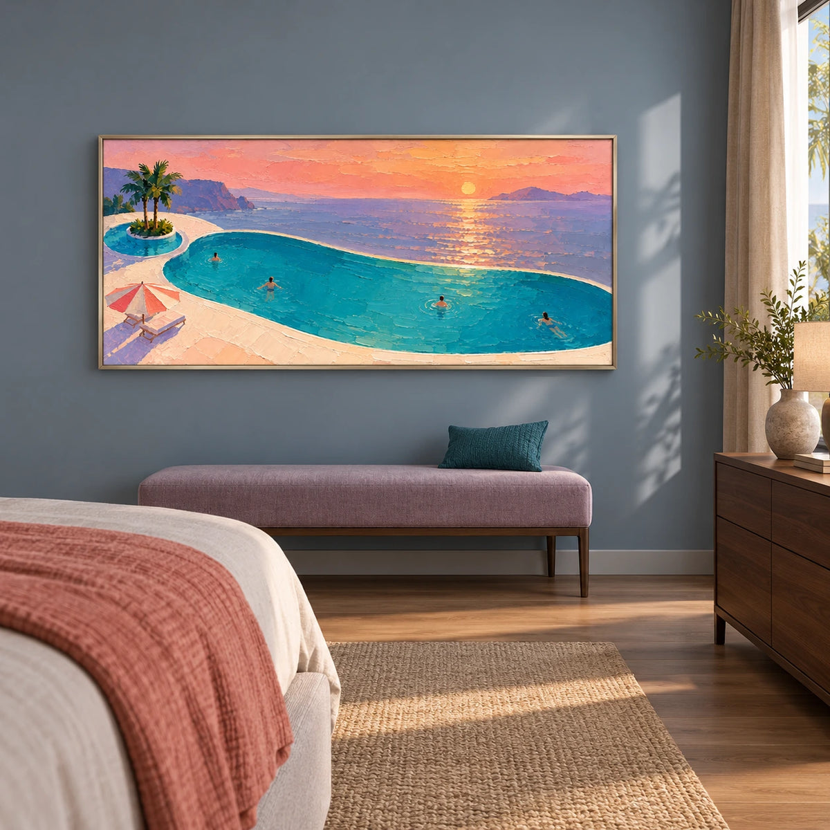 sunset pool over the sea displayed in a bedroom sitting area