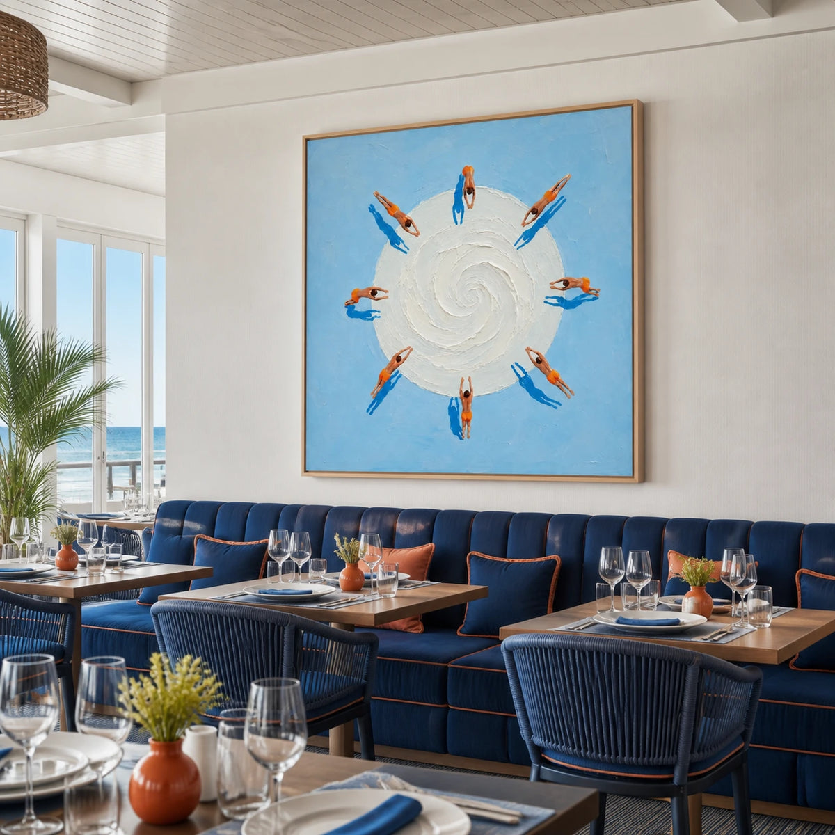 swimmers in orbit displayed in a coastal dining